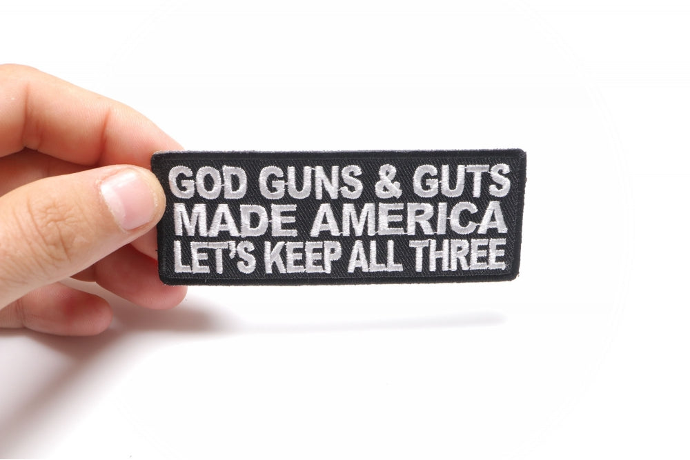 God Guns and Guts Embroidered Patch shown for scale
