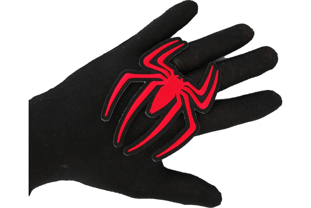 Red Spider Embroidered Patch shown for scale