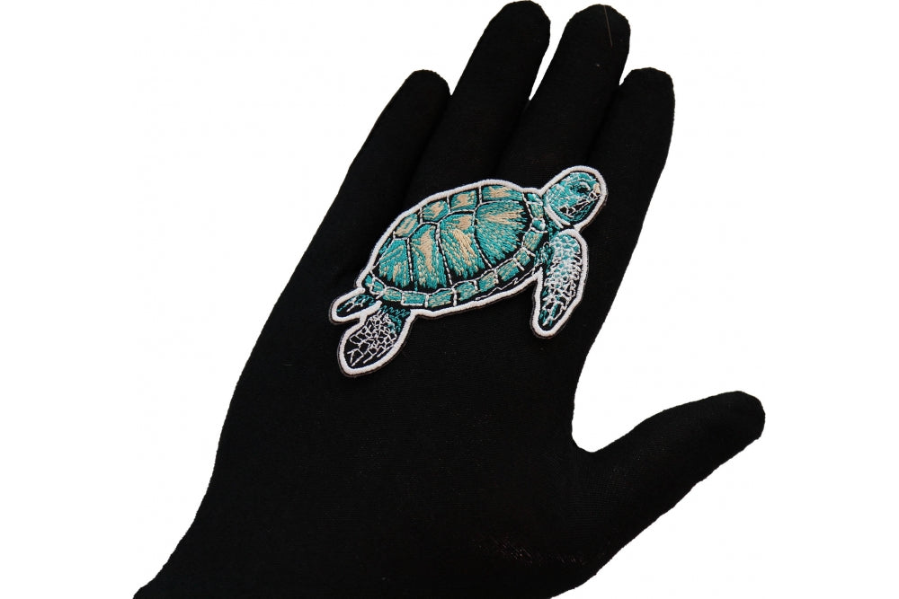 Sea Turtle Embroidered Patch shown for scale