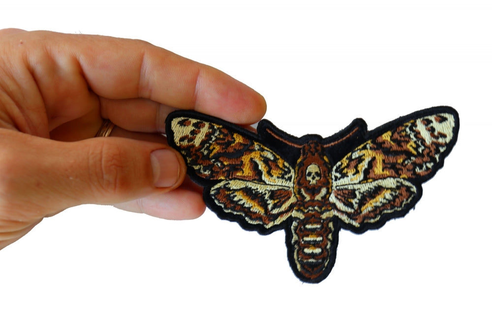 Psycho Moth Skull Embroidered Patch shown for scale
