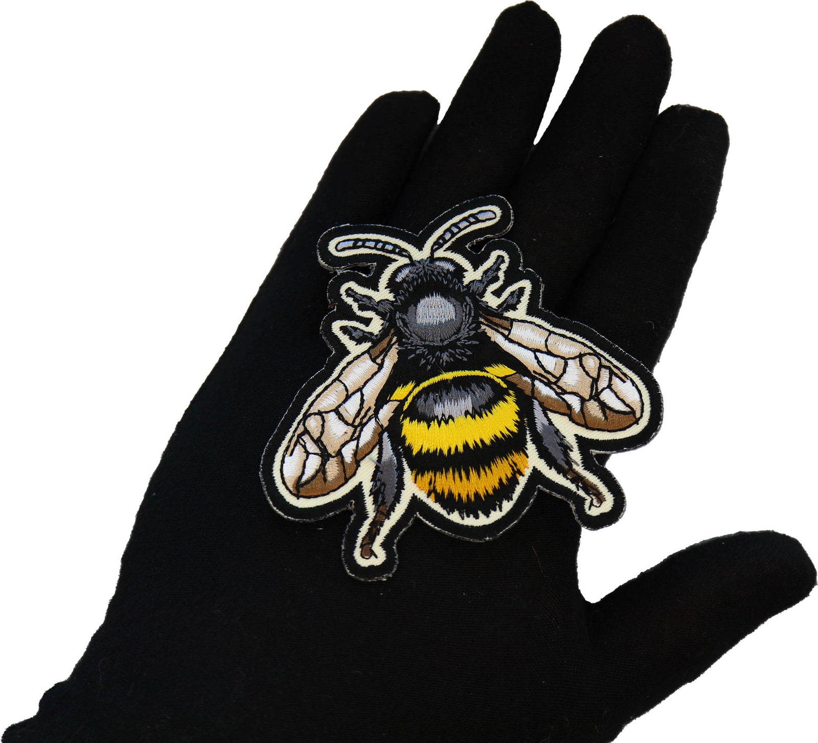 Bee embroidered patch shown in a gloved hand for realistic scale