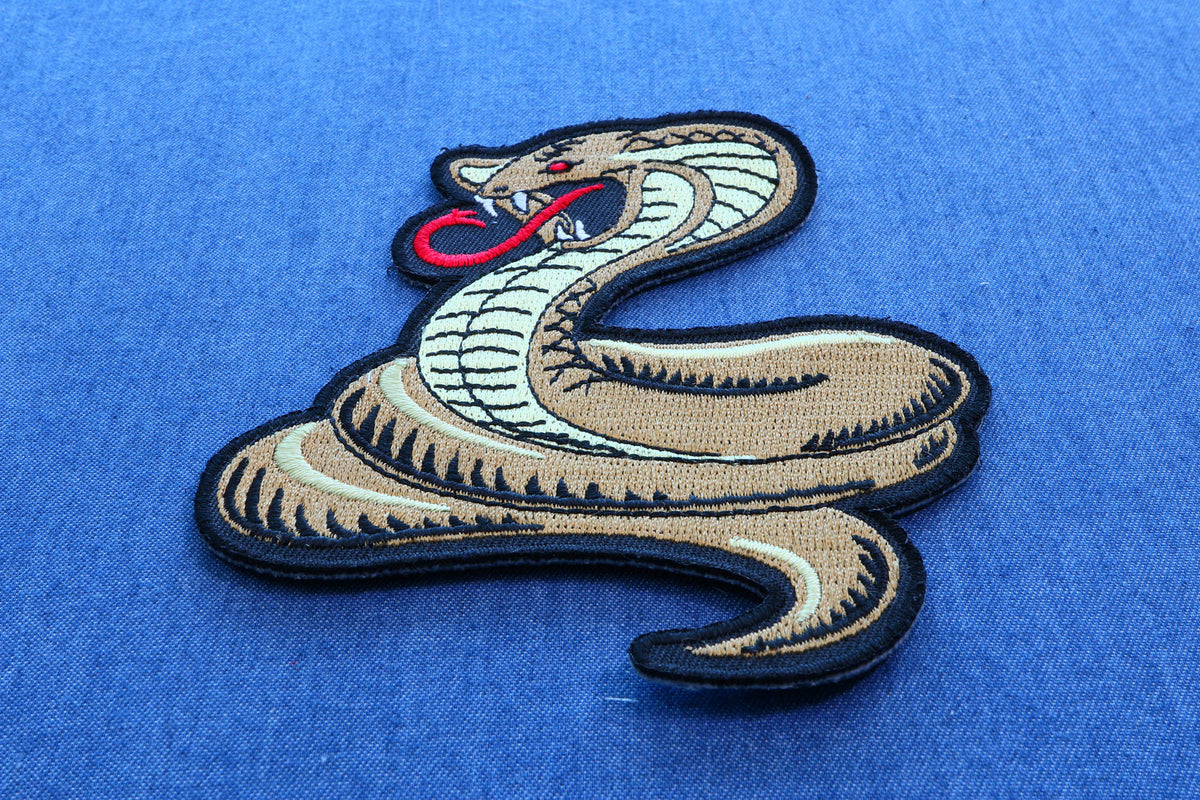 Cobra Embroidered Patch shown for scale