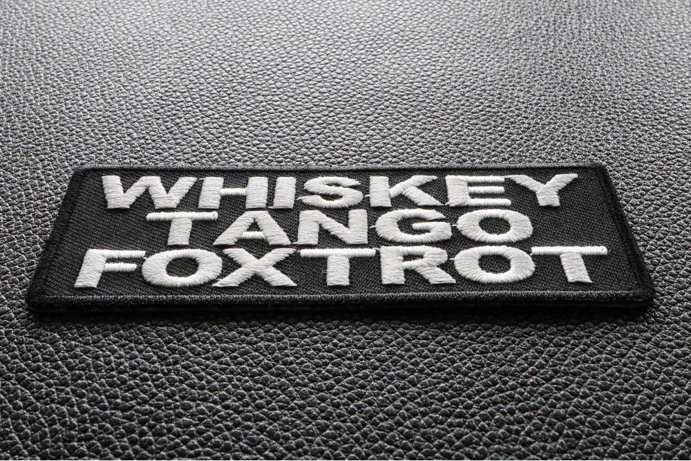 Whiskey Tango Foxtrot" Funny Iron-On/Sew-On Patch (  4 x 2 inche )