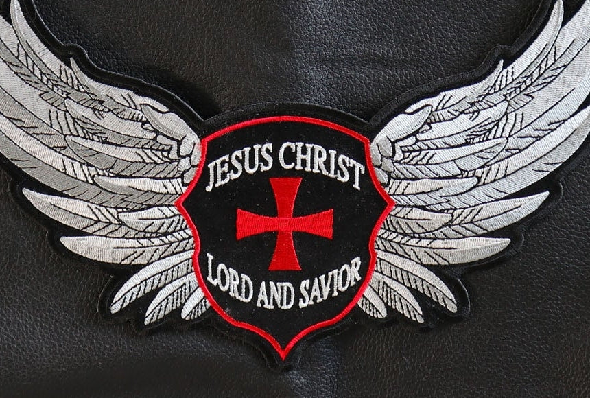 Close-up of Jesus Christ Lord and Savior crest and wing stitching