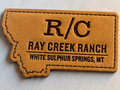 Leather patch grain and engraving detail close-up