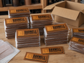 Completed bulk leather patch order ready for packing