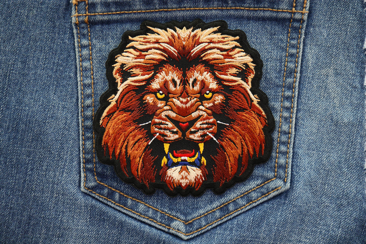 Lion Stare Embroidered Patch shown for scale