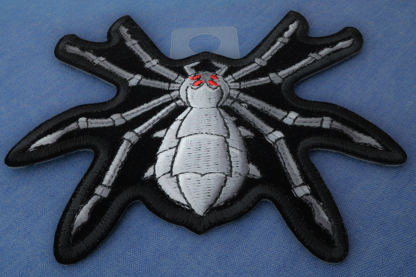 Mechanical Spider Embroidered Patch shown for scale