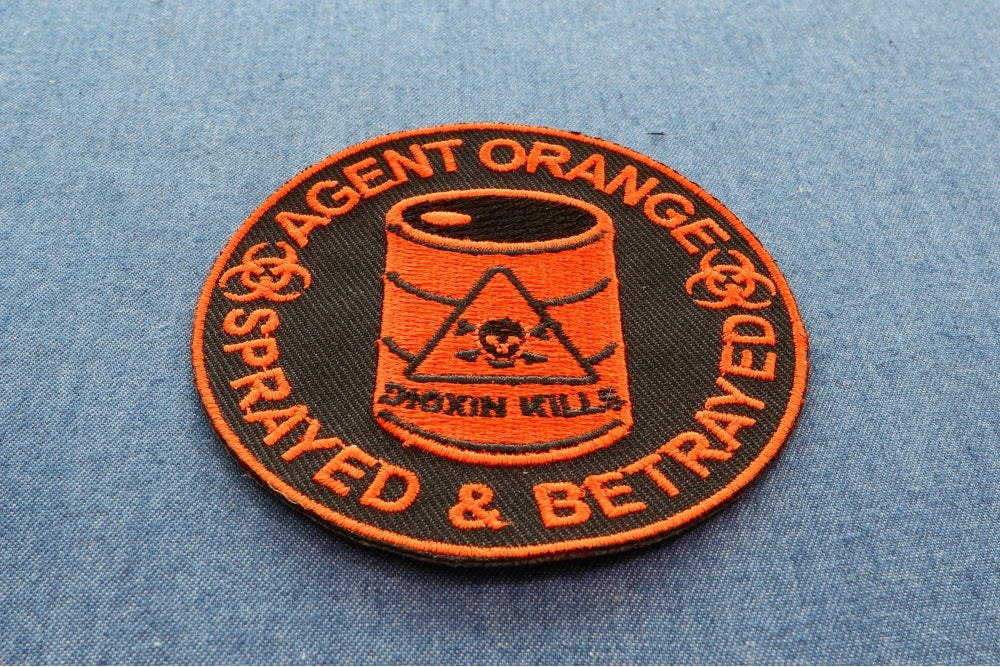 Agent Orange Sprayed and Betrayed Embroidered Patch shown for scale