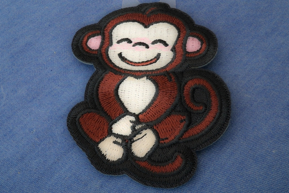 Cute Monkey Embroidered Patch reverse and construction view
