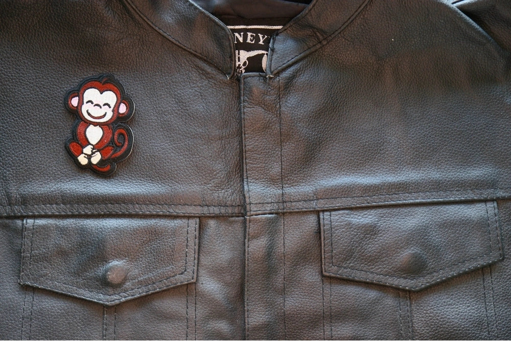 Cute Monkey Embroidered Patch shown for scale