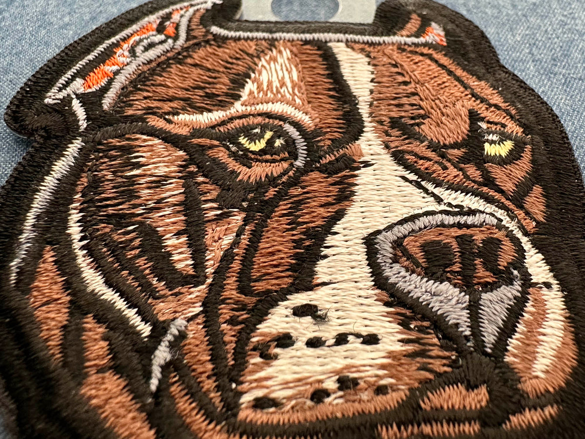 Pitbull Dog Embroidered Patch shown for scale