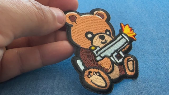 Product video showing the bear with machine gun embroidered patch