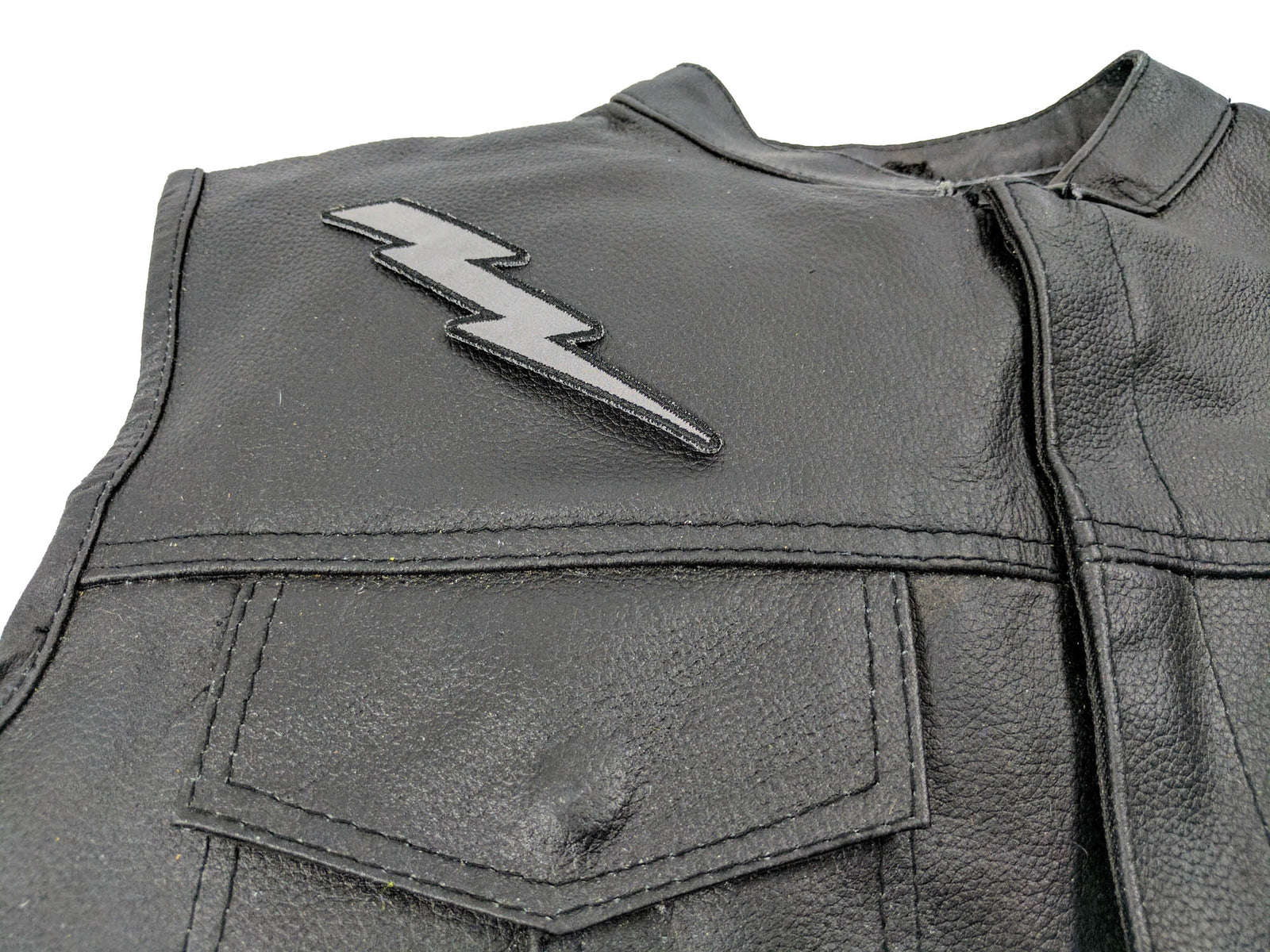 Reflective Lightning Bolt Right Embroidered Patch shown for scale
