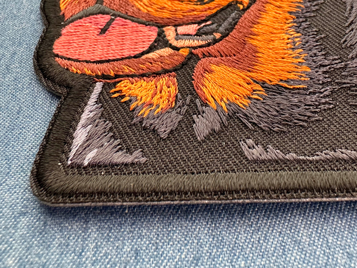 Rottweiler Dog Embroidered Patch shown for scale