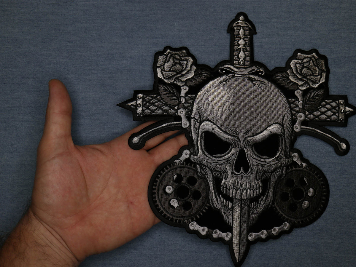 Skull Roses embroidered patch front view in an actual product photo