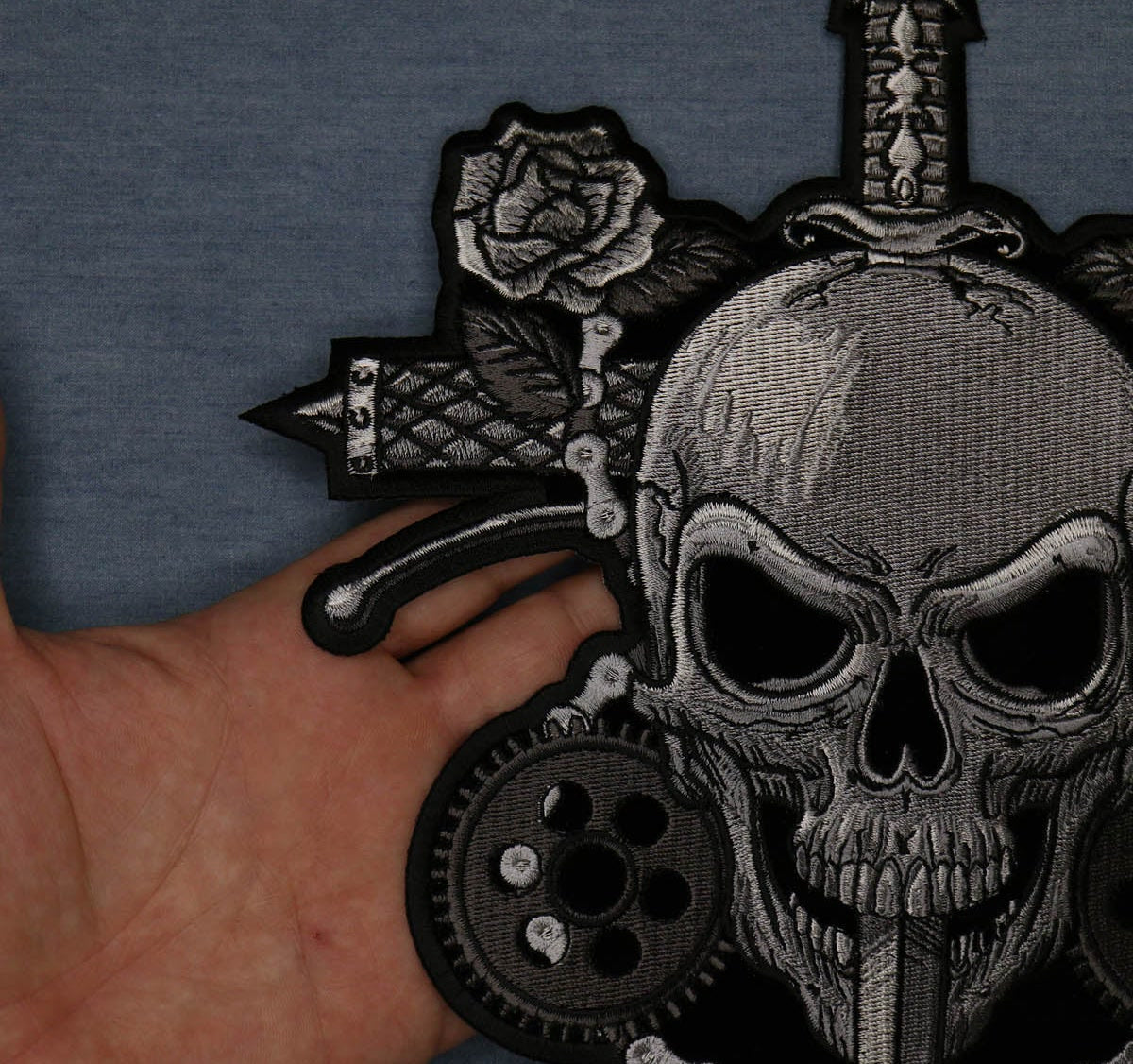 Skull Roses embroidered patch center and thread detail cropped from an actual product photo