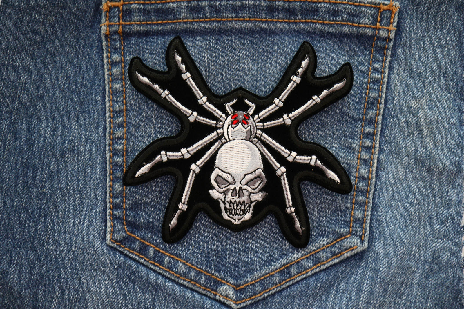 Skull Spider Embroidered Patch shown for scale