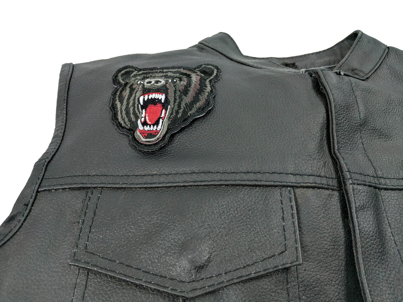 Small Black Bear Embroidered Patch shown for scale
