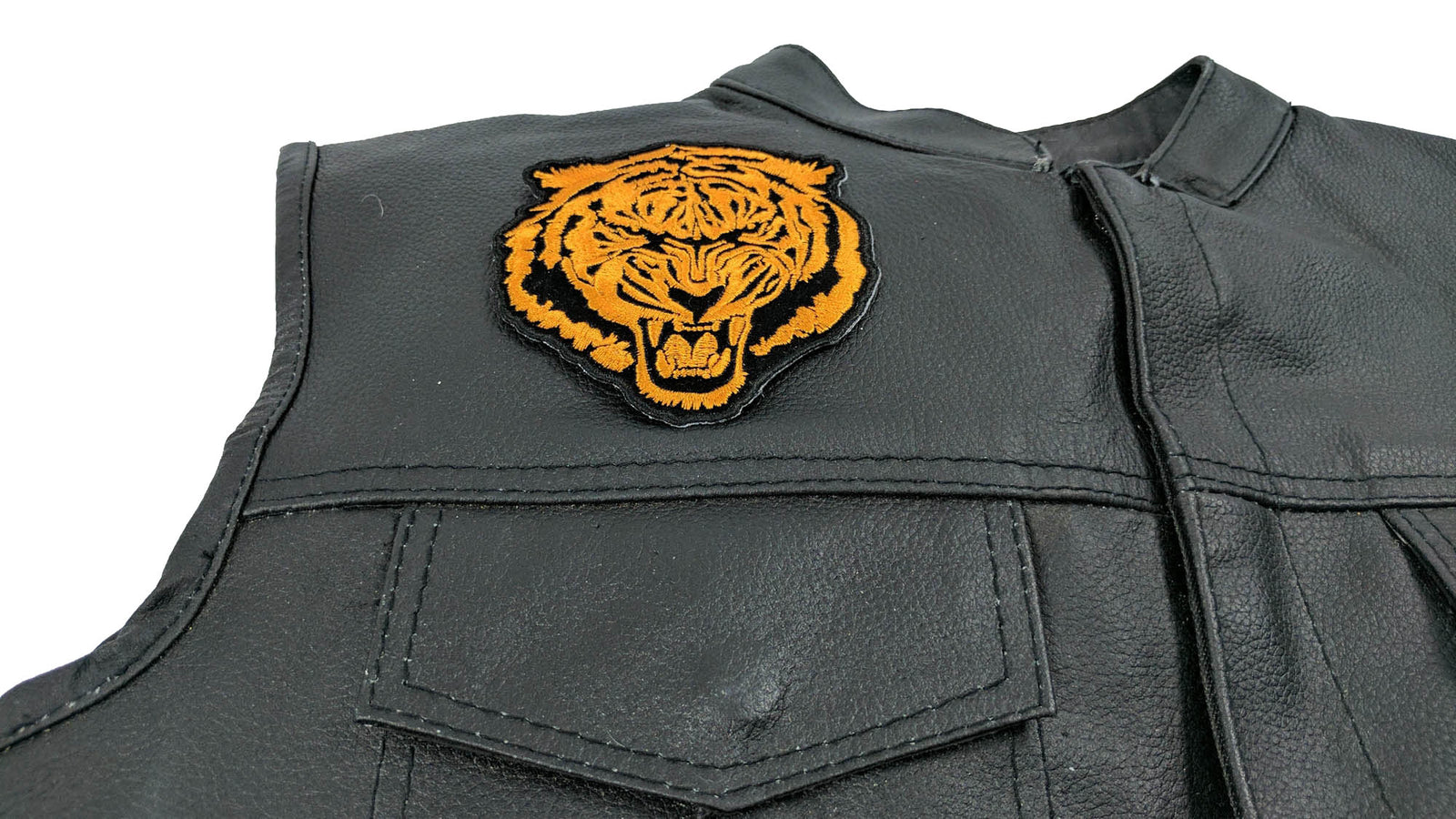 Orange Baron Tiger Embroidered Patch shown for scale