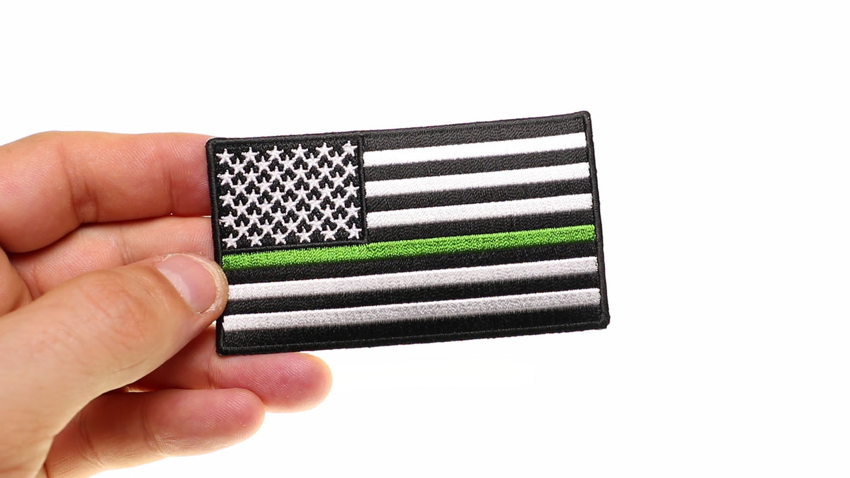 Subdued Green Stripe American Flag Embroidered Patch shown for scale