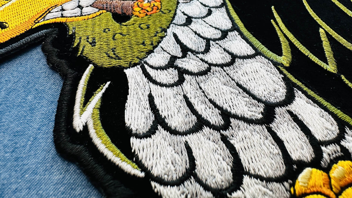 Vulture on Bones Cigar Embroidered Patch shown for scale