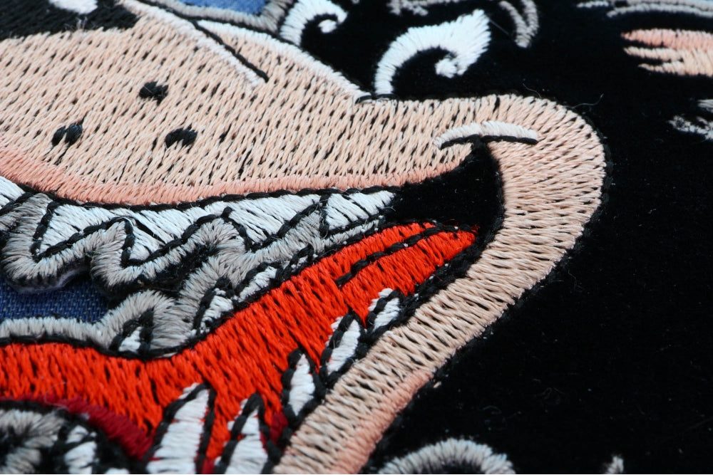 Wolf Iron-On Embroidered Patch shown for scale